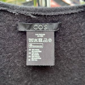 COS black fringe cape